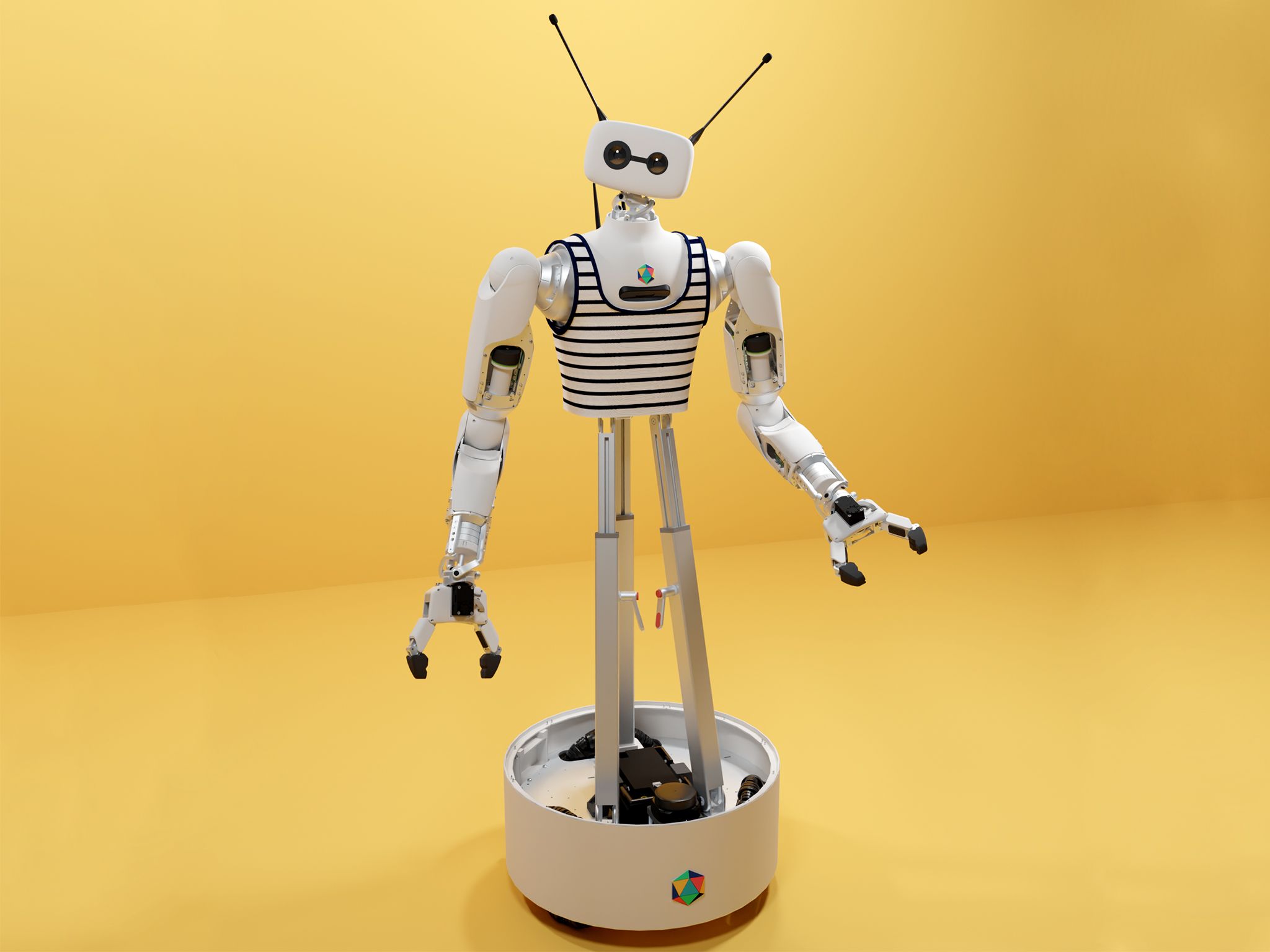 Reachy 2, a robotic torso with two white arms ending in two finger gripper hands, and a white head with two camera eyes, one large and one small, sits in front of a yellow background. There are two pointed antenna protruding from the robot's head, and it wears a black and white striped tank top.