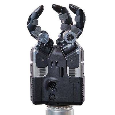 A three fingered black and silver robotic gripper hand on a white background.