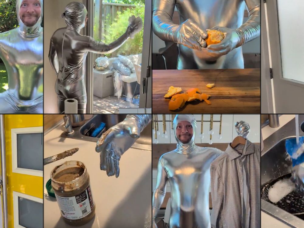 A collection of 8 video stills showing a man in a silver bodysuit doing tasks including picking up dog poop, wiping a window, peeling an orange, opening a door, using keys, having peanut butter on it's finger, holding up a dress shirt on a hangar, and cleaning a pan with a sponge.